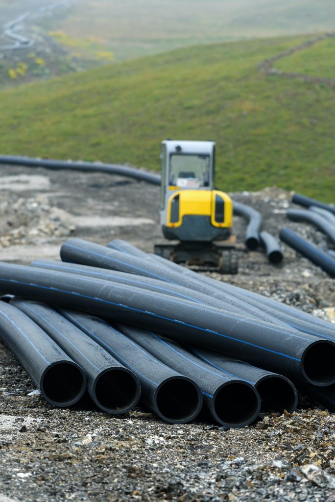 Road construction and storm water pipes for sanitary sewer